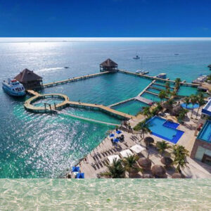 ISLA MUJERES com ENCONTRO COM GOLFINHO,  CLUBE DE PRAIA e CENTRO DE ISLA MUJERES